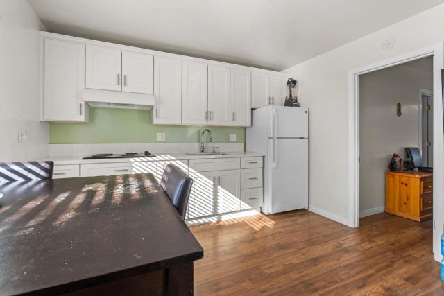 a view of a swimming pool with a lounge chairs