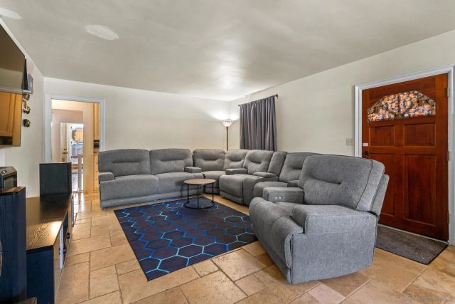 a bed room with a bed and a desk