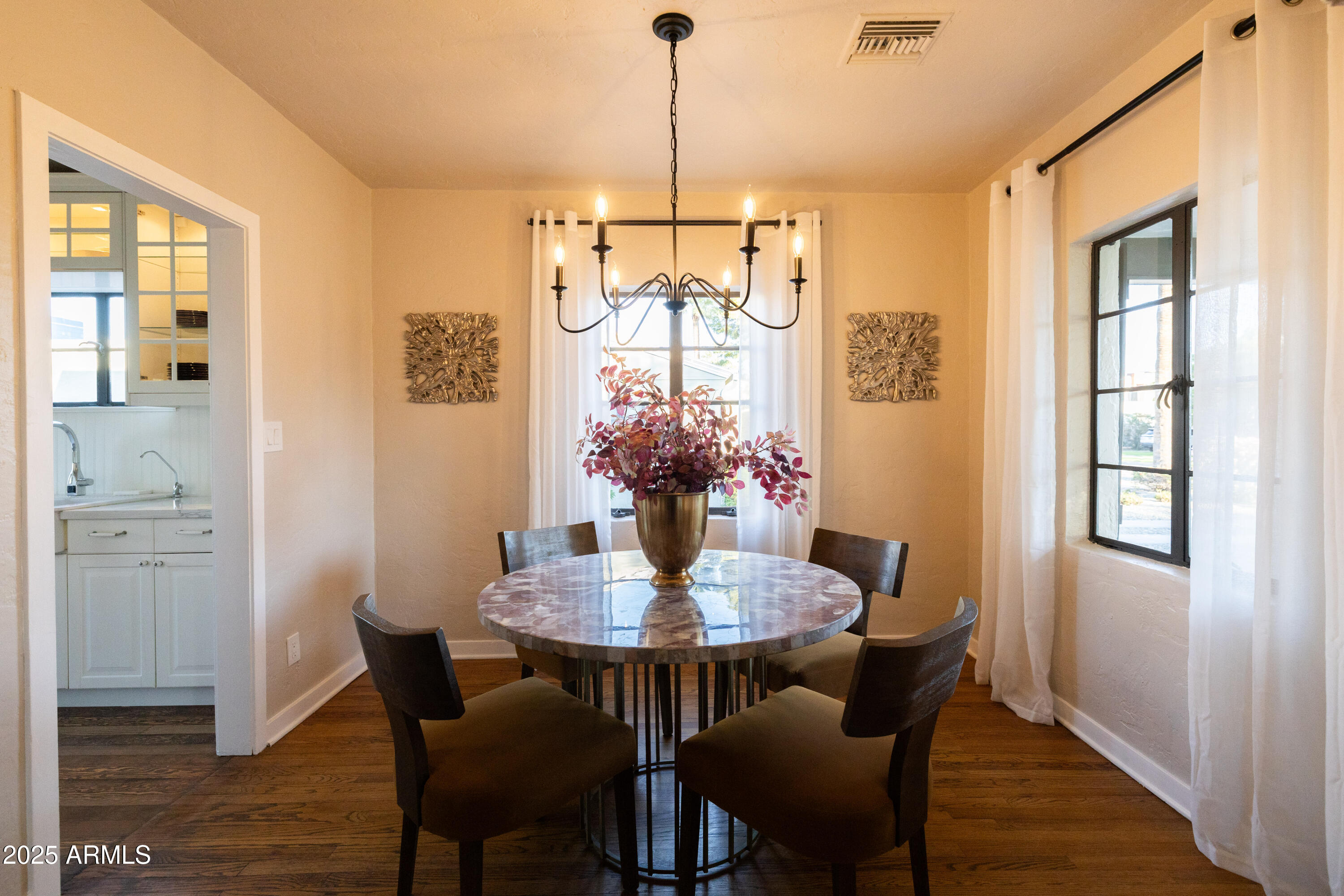 126 West Coronado Road Phoenix, AZ 85003 - Photo 16 of 60 a dining room with furniture and window