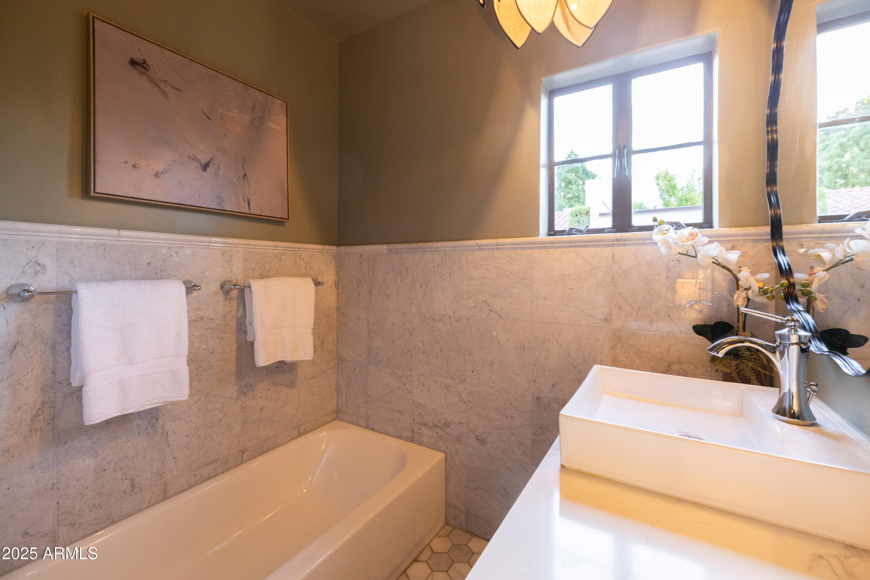 126 West Coronado Road Phoenix, AZ 85003 - Photo 35 of 60 a bathroom with a sink and a bathtub
