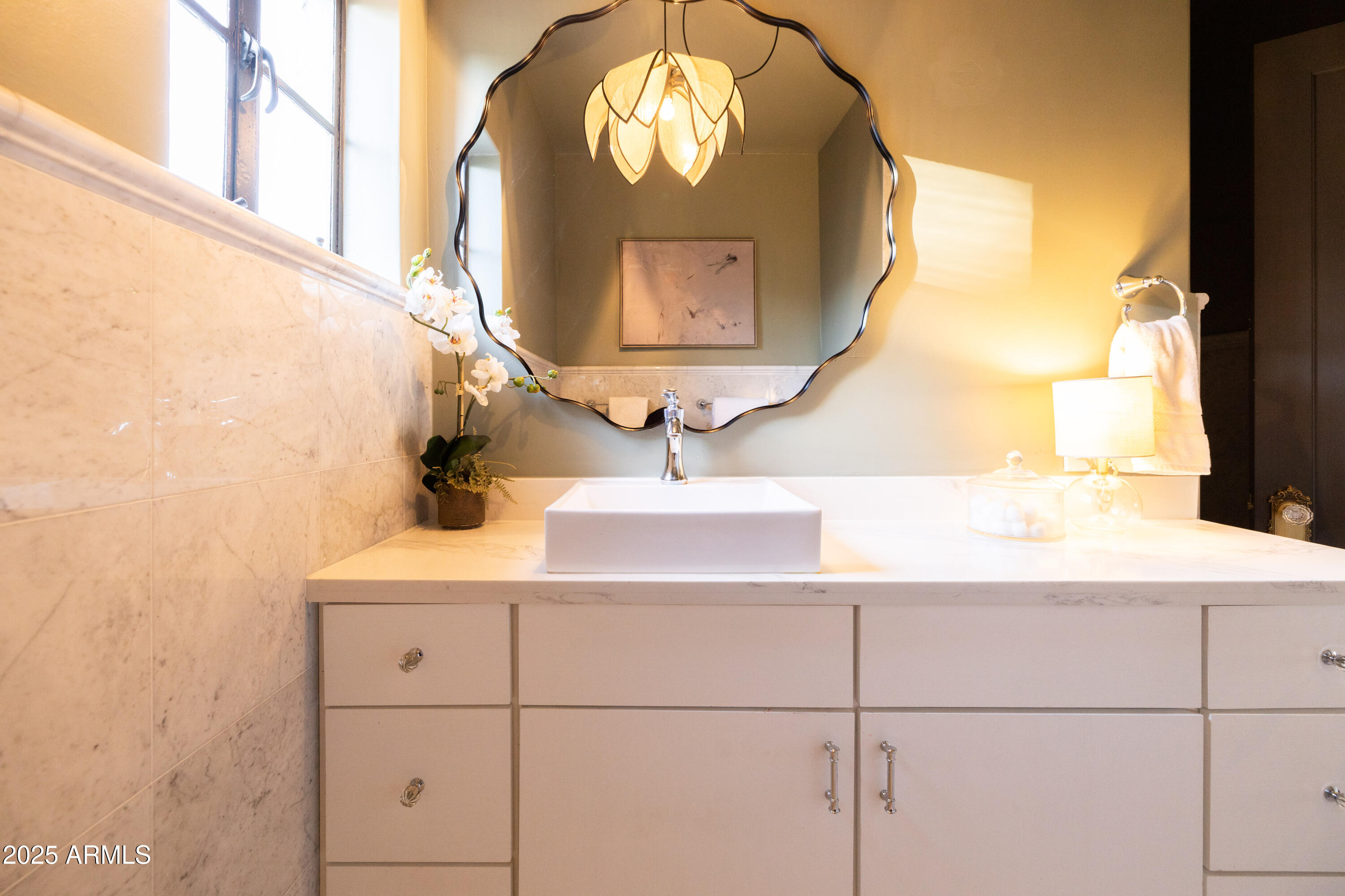 126 West Coronado Road Phoenix, AZ 85003 - Photo 36 of 60 a bathroom with a sink and a mirror