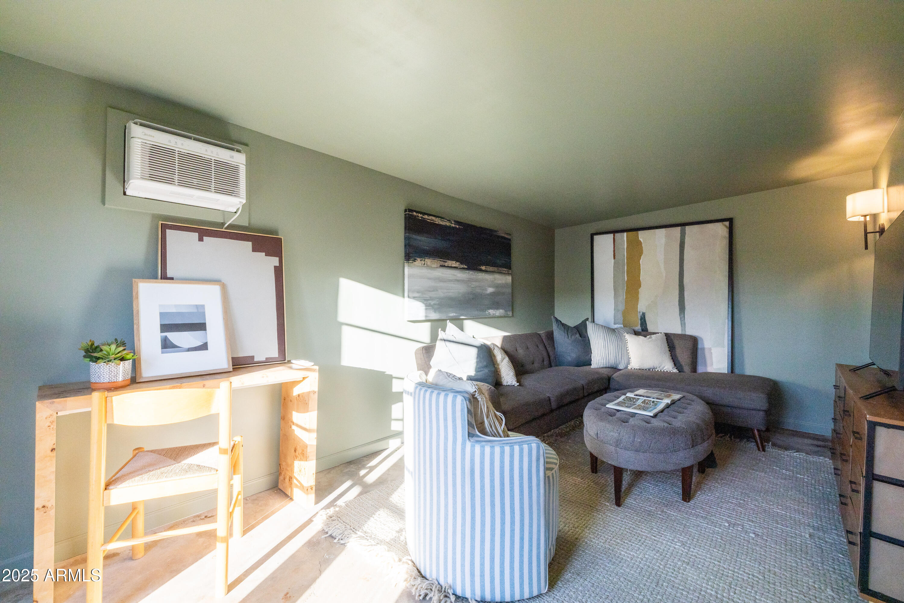 126 West Coronado Road Phoenix, AZ 85003 - Photo 56 of 60 a living room with furniture and a flat screen tv