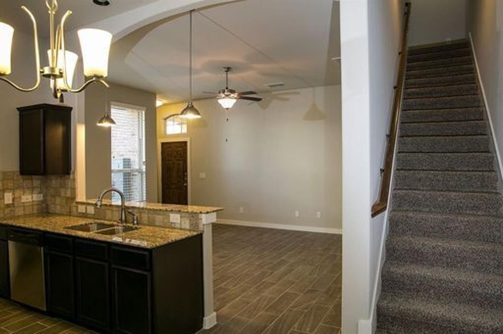 117 Calm Water Loop Bastrop, TX 78602 - Photo 2 of 7 a bathroom with a sink and a mirror