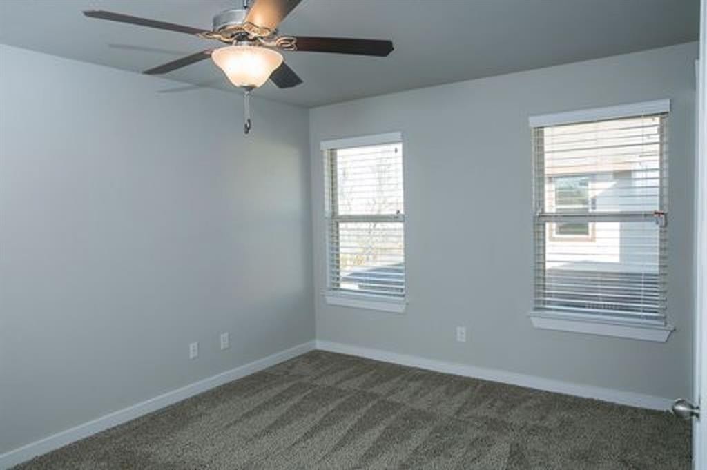 117 Calm Water Loop Bastrop, TX 78602 - Photo 7 of 7 a view of an empty room with a window