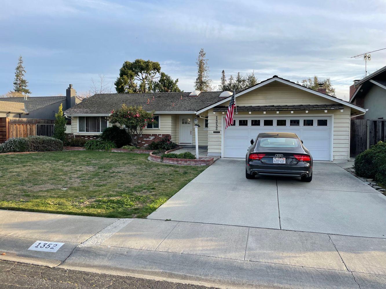a car parked in front of house