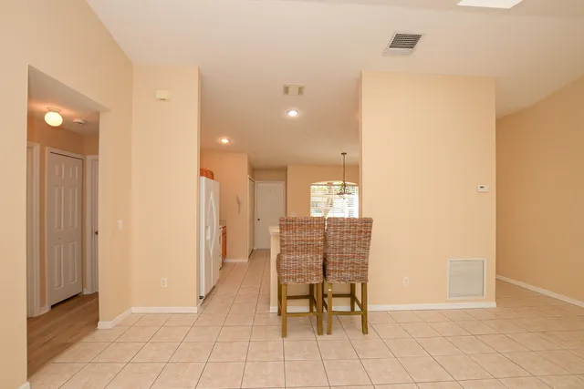 a view of kitchen with furniture and window