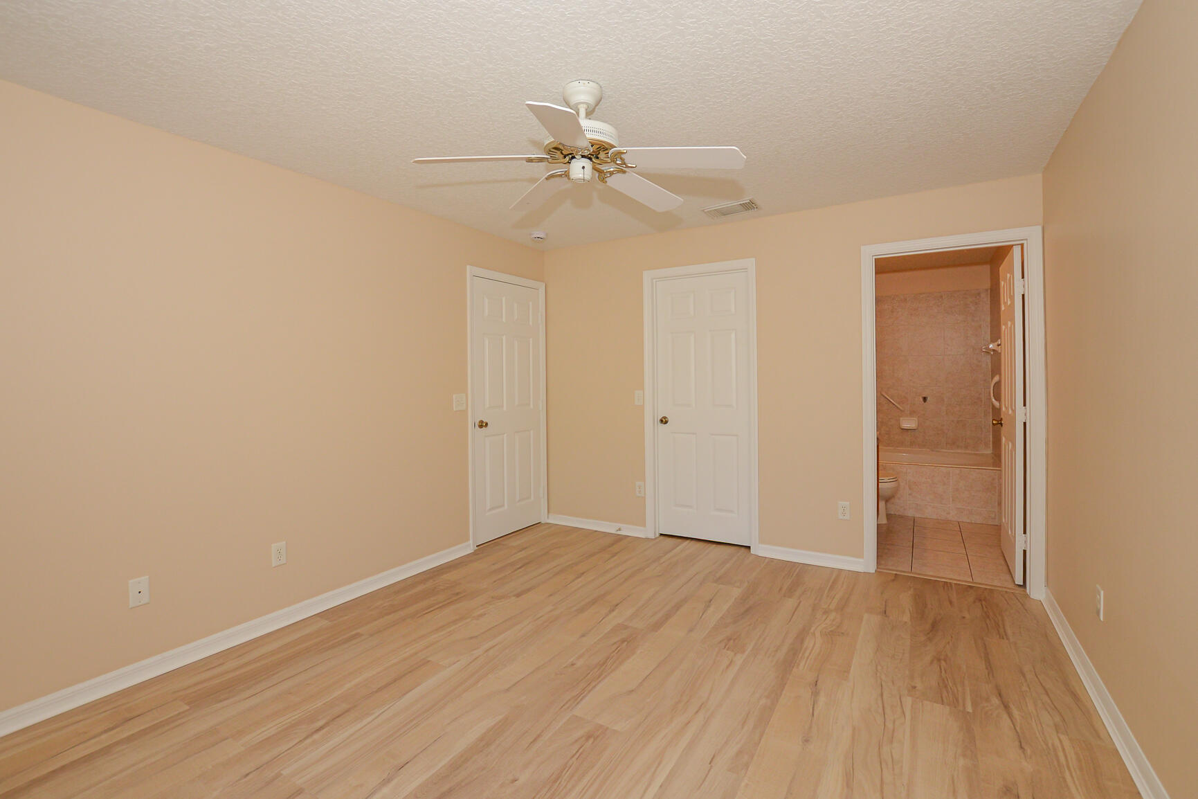 2201 Southeast Carnation Road Port St. Lucie, FL 34952 - Photo 19 of 37 wooden floor in an empty room