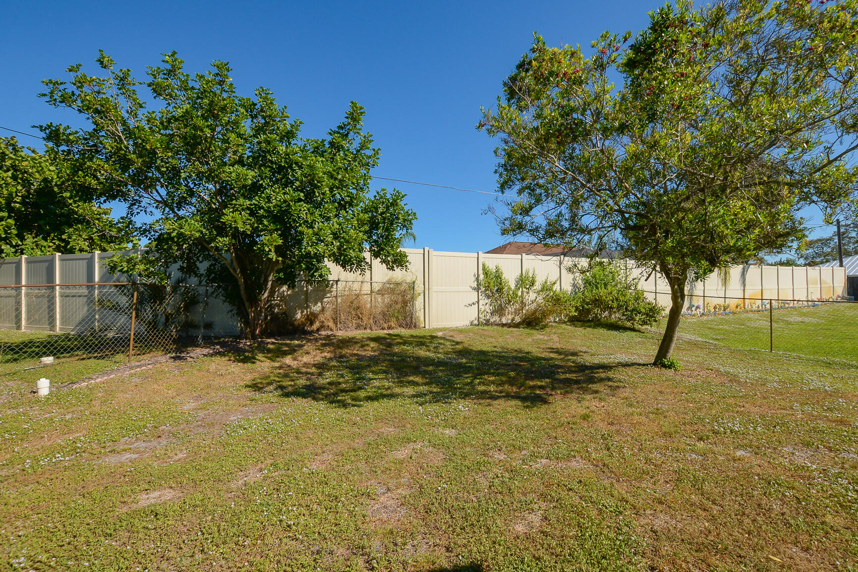 2201 Southeast Carnation Road Port St. Lucie, FL 34952 - Photo 37 of 37 a view of a tree with a yard