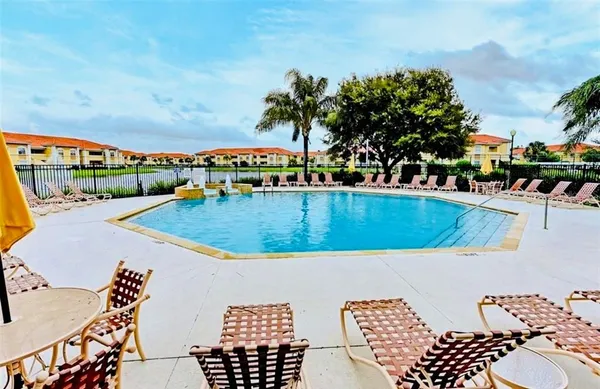a view of a swimming pool with a terrace