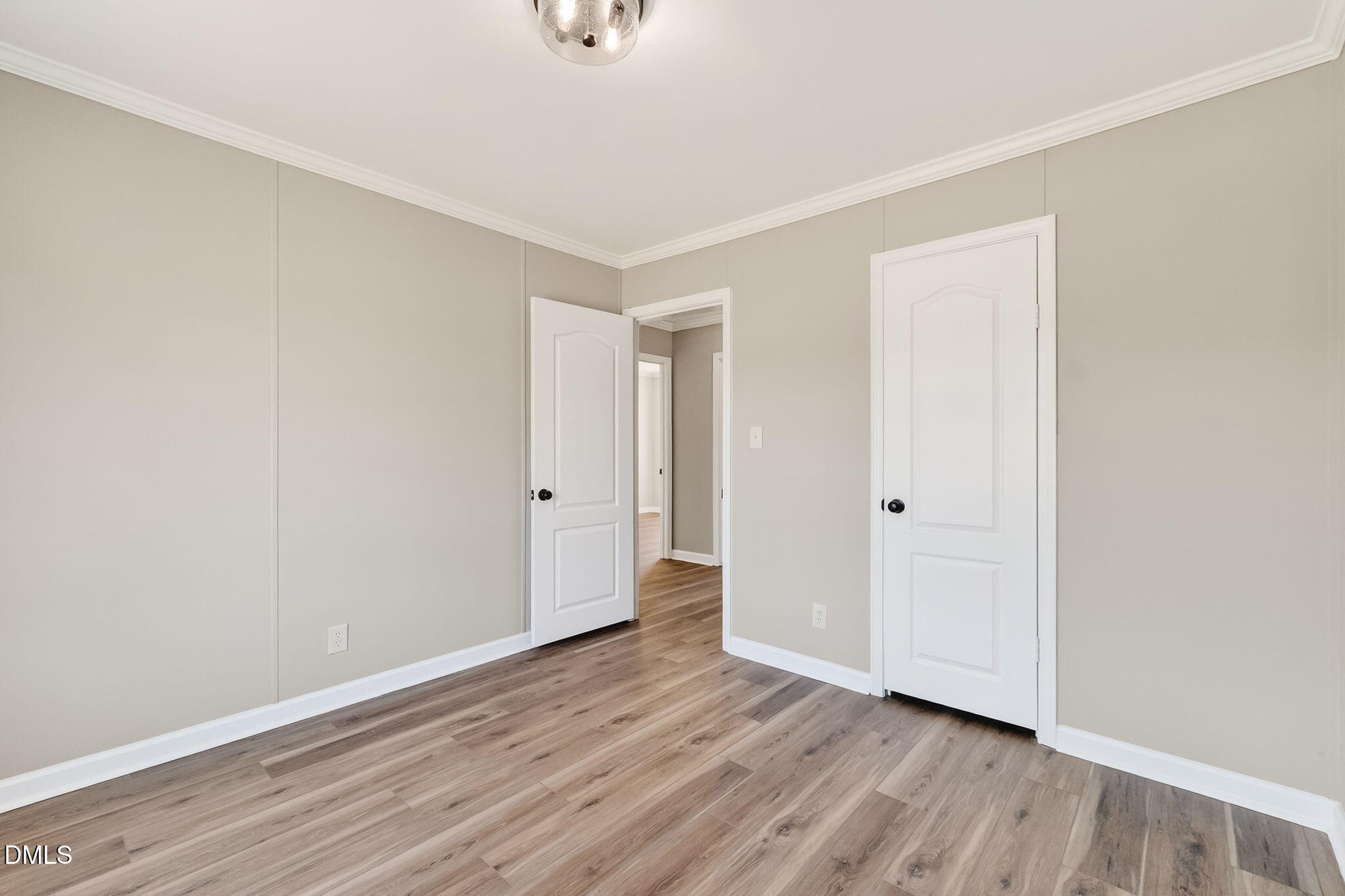 10015 Smith Road Middlesex, NC 27557 - Photo 37 of 48 a view of an empty room with wooden floor