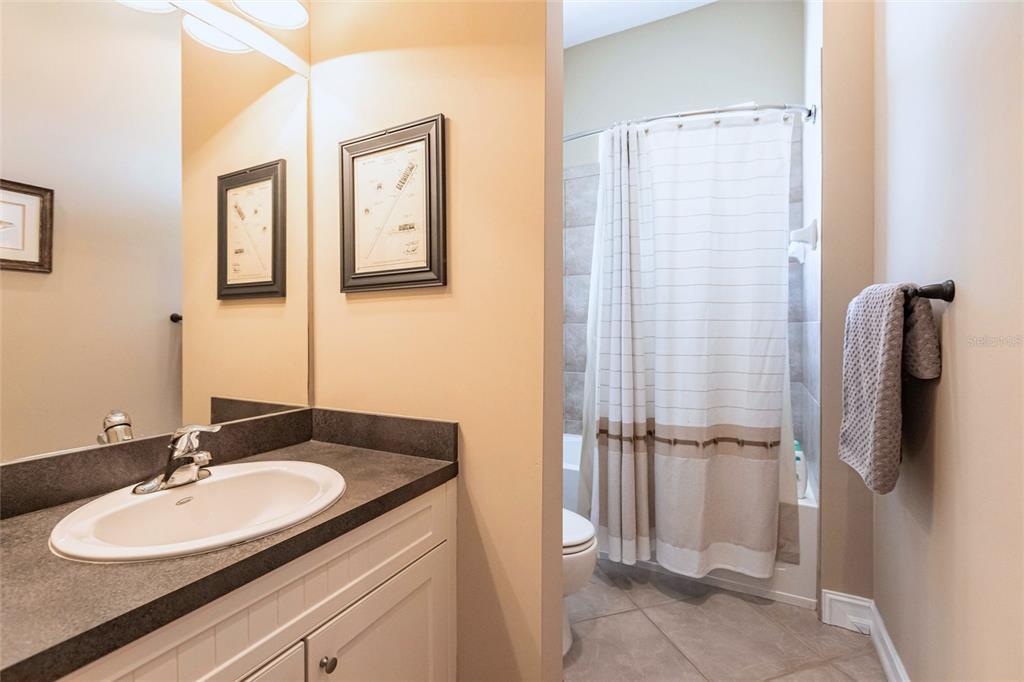 3712 Balboa Court Punta Gorda, FL 33983 - Photo 16 of 53 a bathroom with a granite countertop sink and a mirror