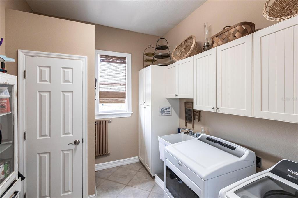3712 Balboa Court Punta Gorda, FL 33983 - Photo 19 of 53 a view of a hallway with workspace and a window