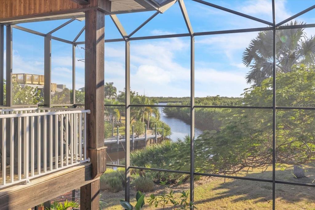3712 Balboa Court Punta Gorda, FL 33983 - Photo 21 of 53 a bathroom with a glass door and glass door