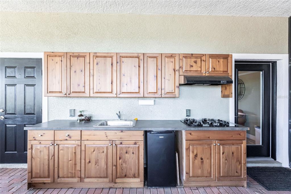 3712 Balboa Court Punta Gorda, FL 33983 - Photo 36 of 53 a kitchen with stainless steel appliances granite countertop a sink stove and cabinets