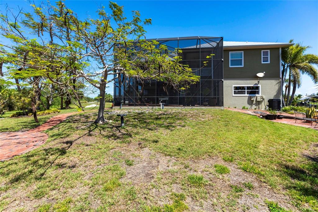 3712 Balboa Court Punta Gorda, FL 33983 - Photo 42 of 53 a house view with a garden space