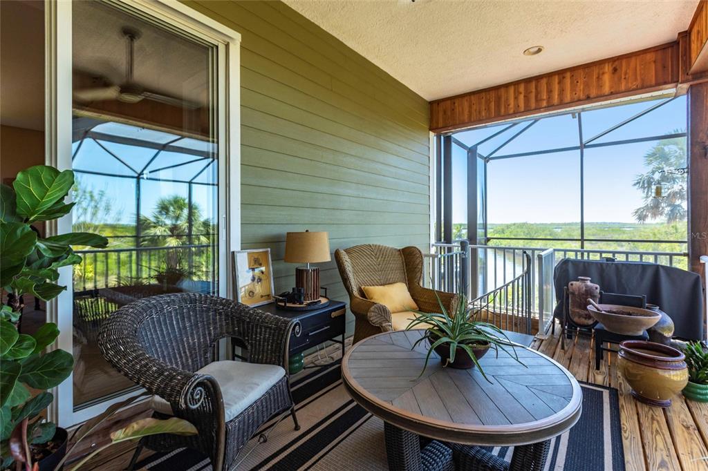3712 Balboa Court Punta Gorda, FL 33983 - Photo 9 of 53 a view of balcony with a dining table and chairs