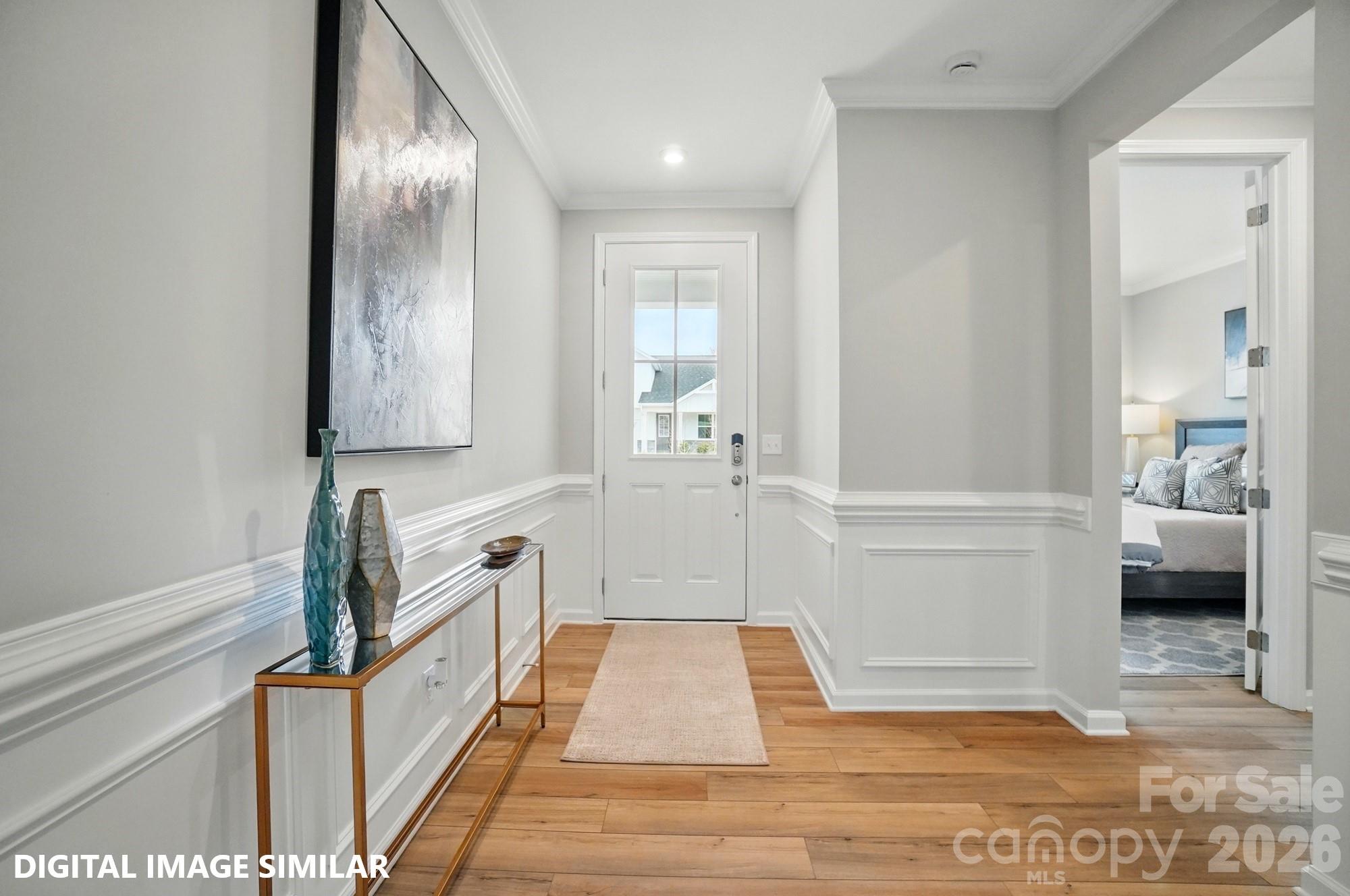 9969 Cask Way Huntersville, NC 28078 - Photo 18 of 36 a view of a kitchen with wooden floor and electronic appliances