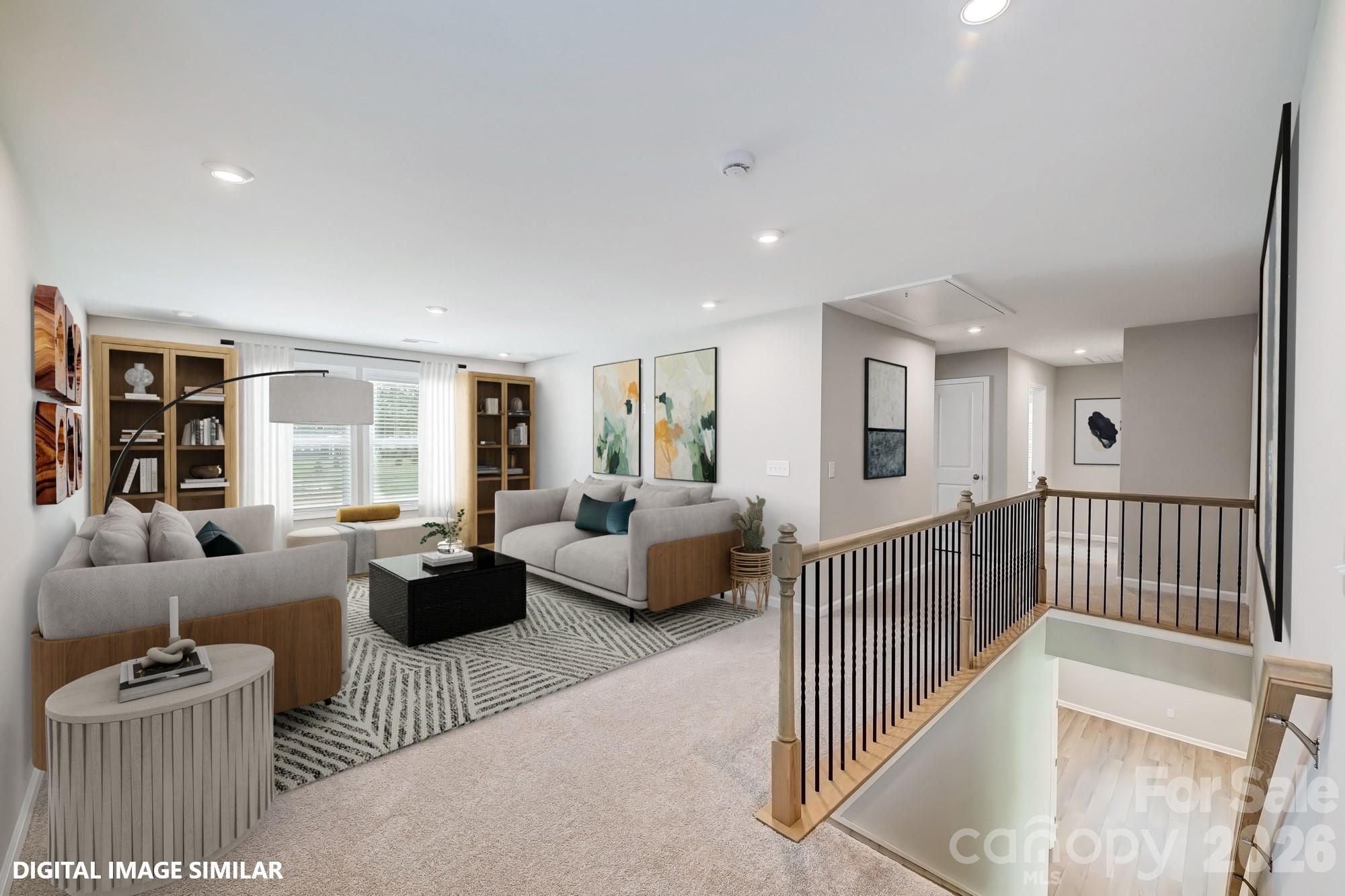 9969 Cask Way Huntersville, NC 28078 - Photo 23 of 36 a living room with furniture or couch and a large window