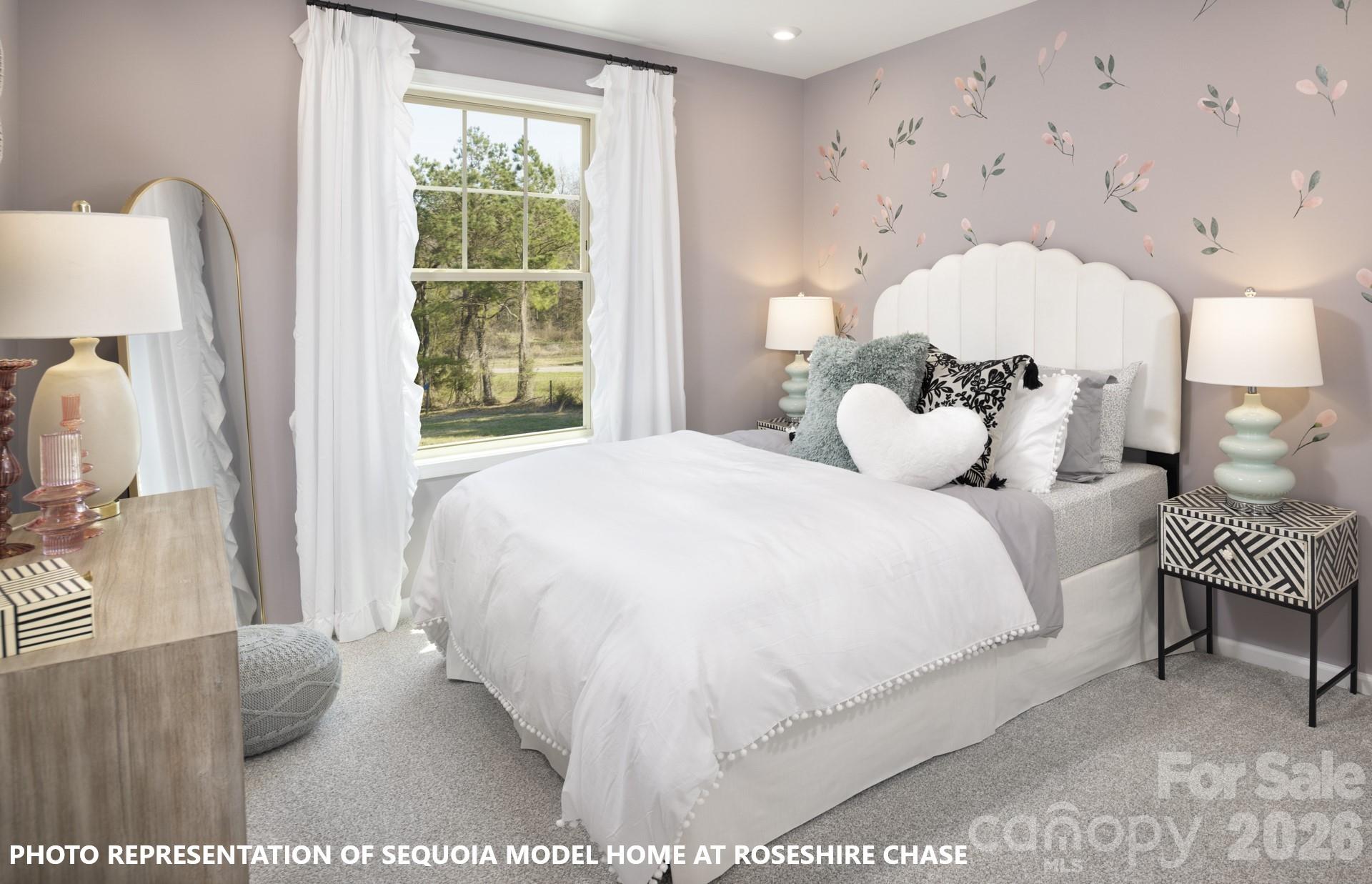 9969 Cask Way Huntersville, NC 28078 - Photo 24 of 36 a bedroom with a bed and a large mirror