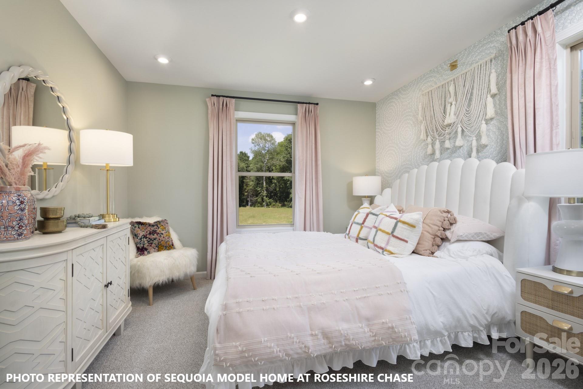 9969 Cask Way Huntersville, NC 28078 - Photo 28 of 36 a large white bed in a white room