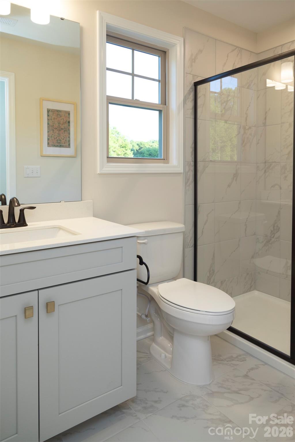 9969 Cask Way Huntersville, NC 28078 - Photo 29 of 36 a bathroom with a sink toilet and shower