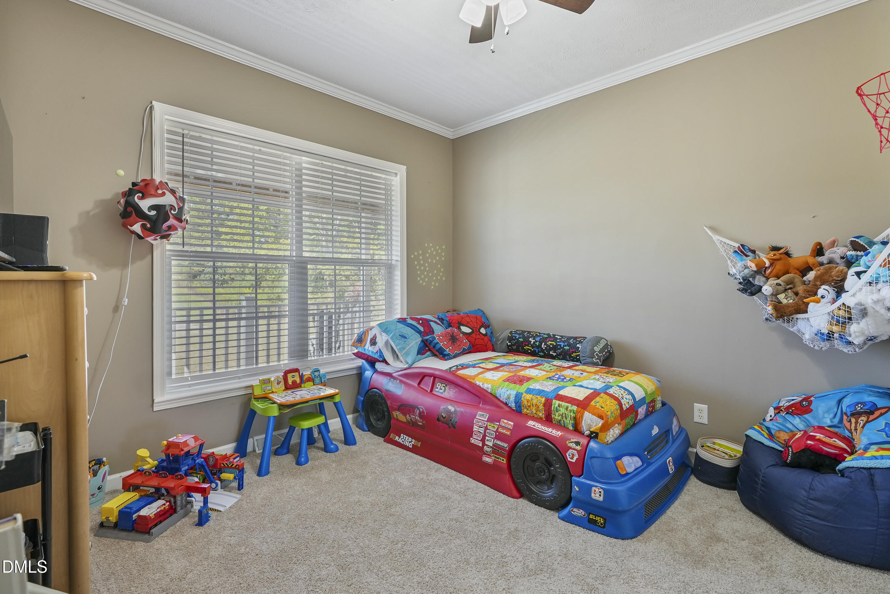 700 Mann Road Coats, NC 27521 - Photo 19 of 35 a bedroom with a bed and a window