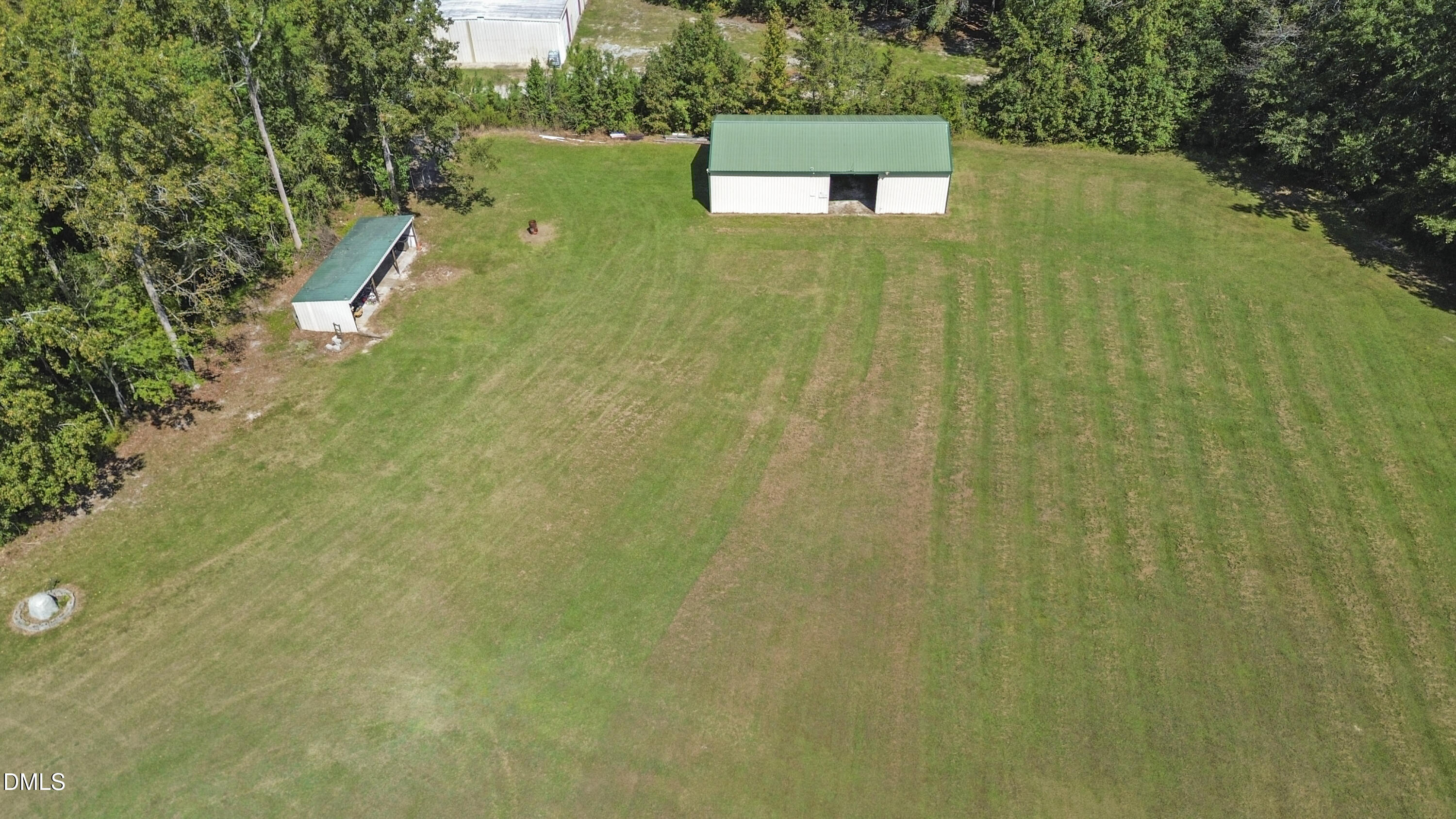 700 Mann Road Coats, NC 27521 - Photo 30 of 35 a view of a lake from a yard