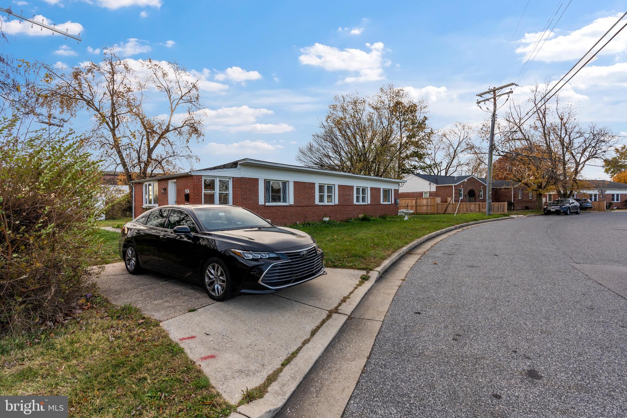 730 New Pittsburg Avenue, Unit 2 Baltimore, MD 21222 - Photo 24 of 27 a car parked on the side of the road