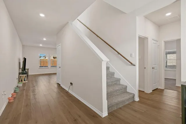 a view of entryway with wooden floor