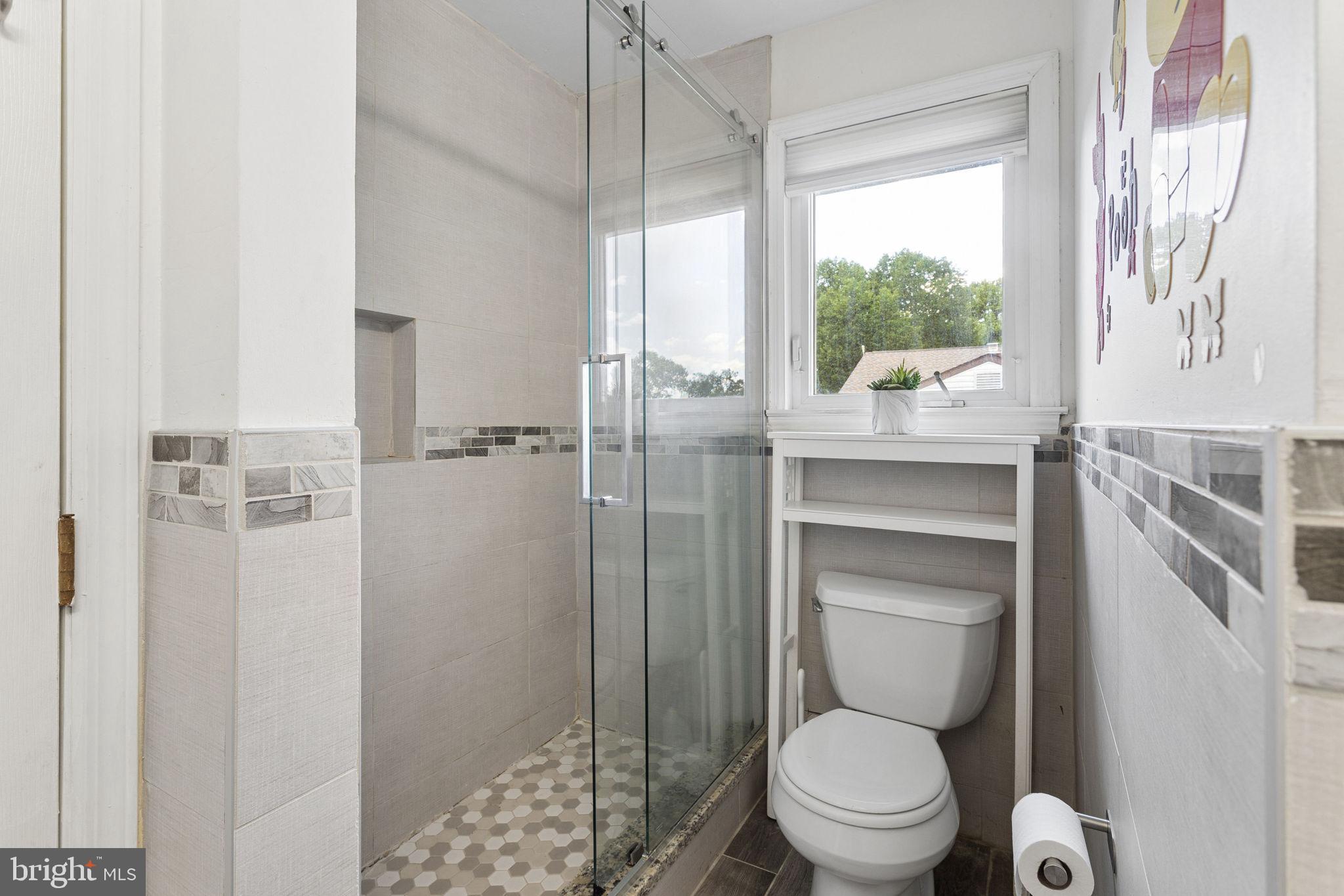 252 Sandringham Road Cherry Hill, NJ 08003 - Photo 21 of 31 a bathroom with a toilet and a shower