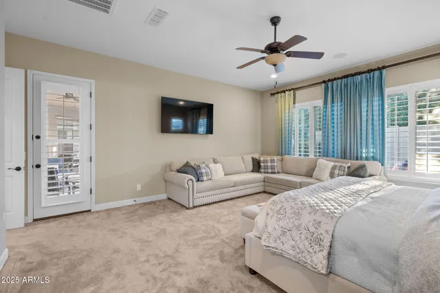 an aerial view of a houses with a lake view