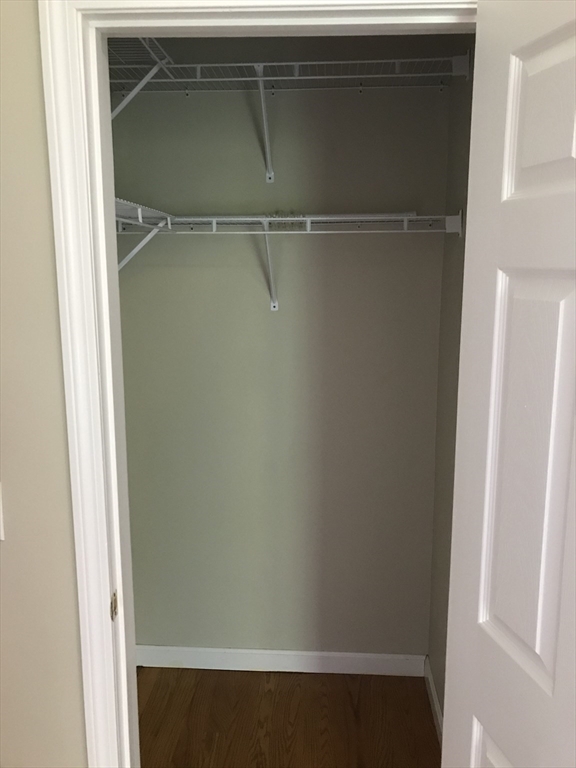 73 Broadway, Unit 3 Quincy, MA 02169 - Photo 9 of 16 a close view of closet
