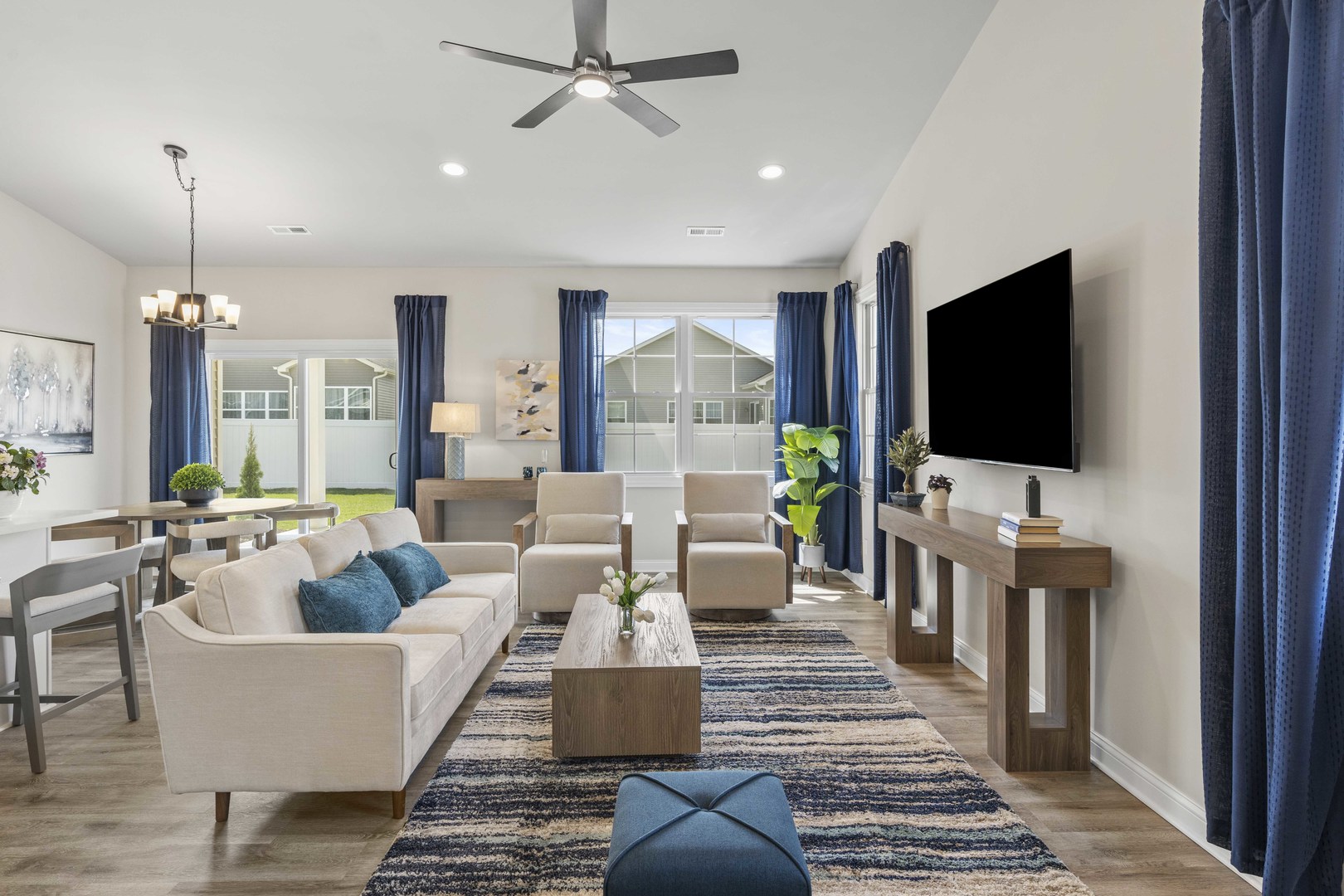 6375 Jasmine Avenue Portage, IN 46368 - Photo 11 of 32 a living room with furniture and a flat screen tv