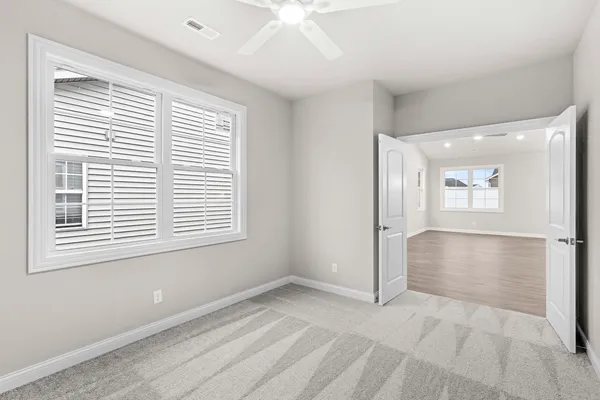 a view of an empty room with a window