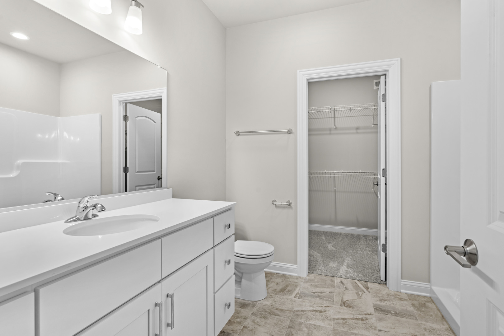 6375 Jasmine Avenue Portage, IN 46368 - Photo 19 of 32 a bathroom with a sink a toilet and shower