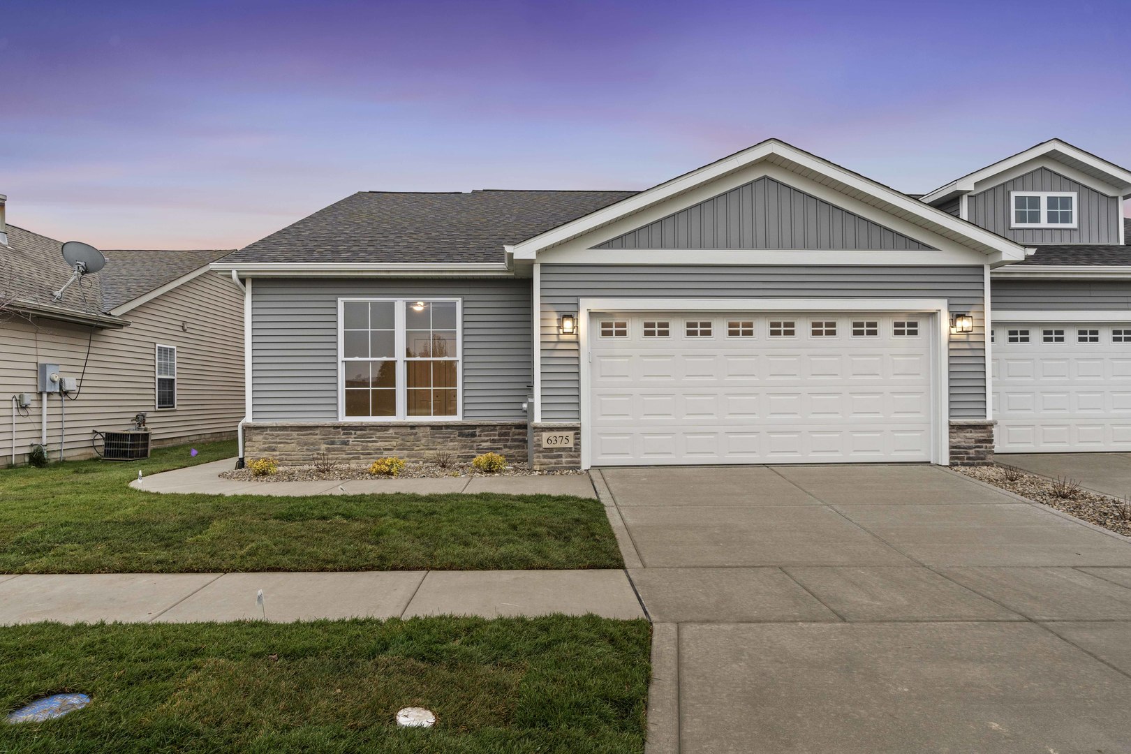 6375 Jasmine Avenue Portage, IN 46368 - Photo 2 of 32 a front view of a house with a yard