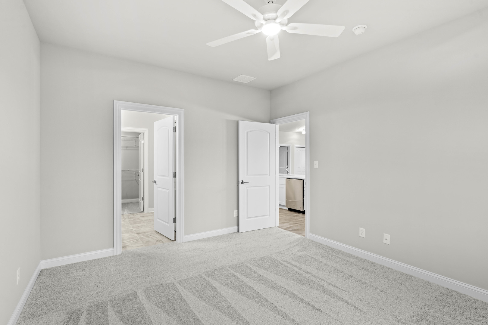 6375 Jasmine Avenue Portage, IN 46368 - Photo 21 of 32 an empty room with a bathroom and a chandelier fan