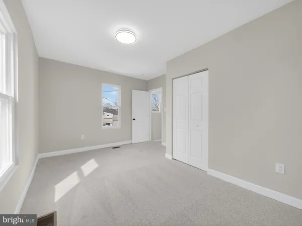 an empty room with a natural light