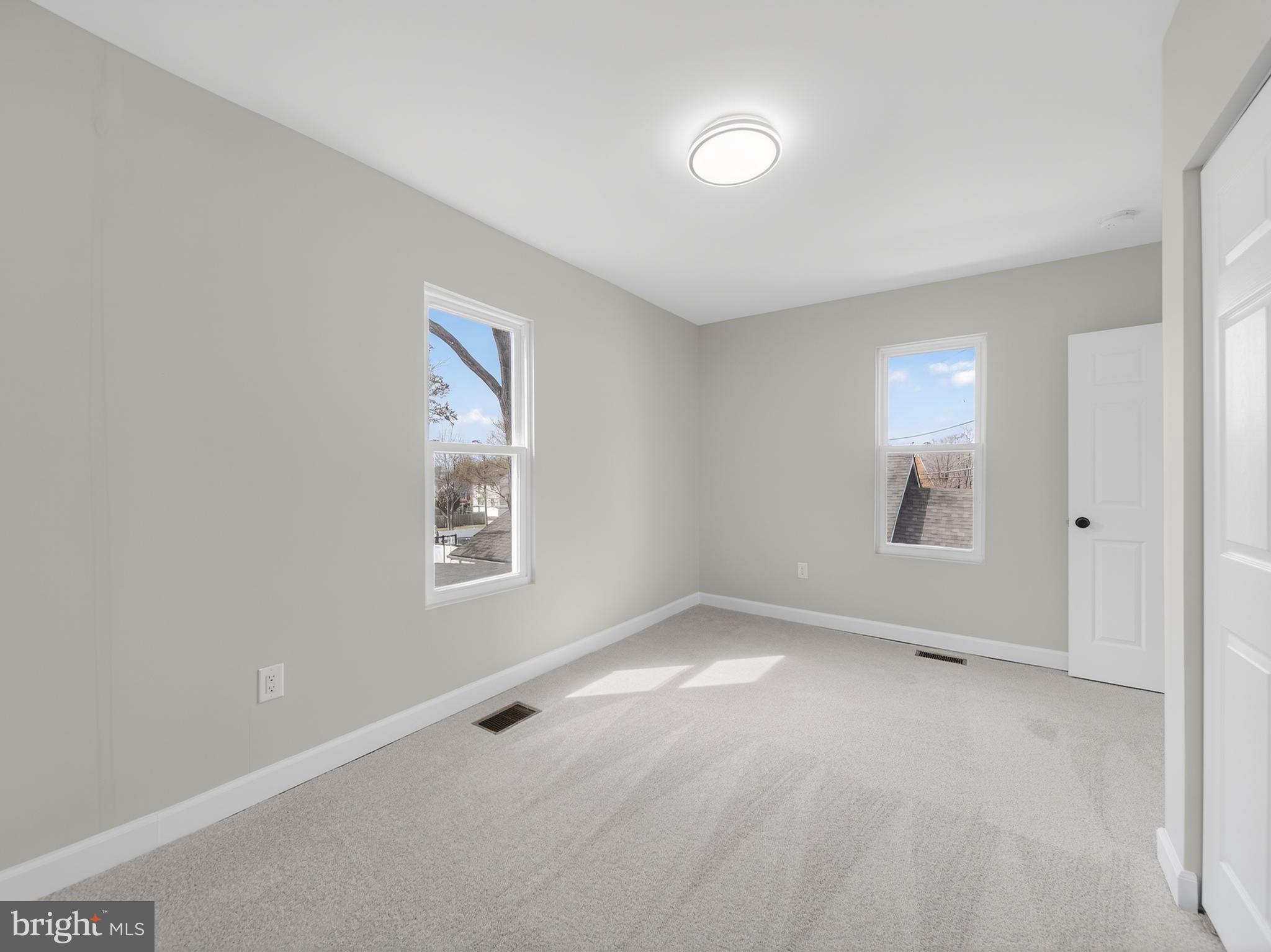 5919 Addison Road Capitol Heights, MD 20743 - Photo 24 of 40 an empty room with a window