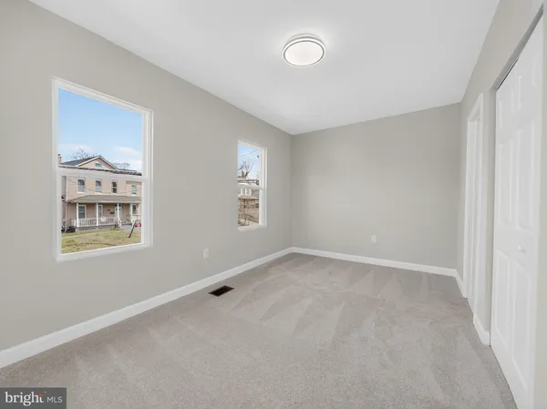 an empty room with windows