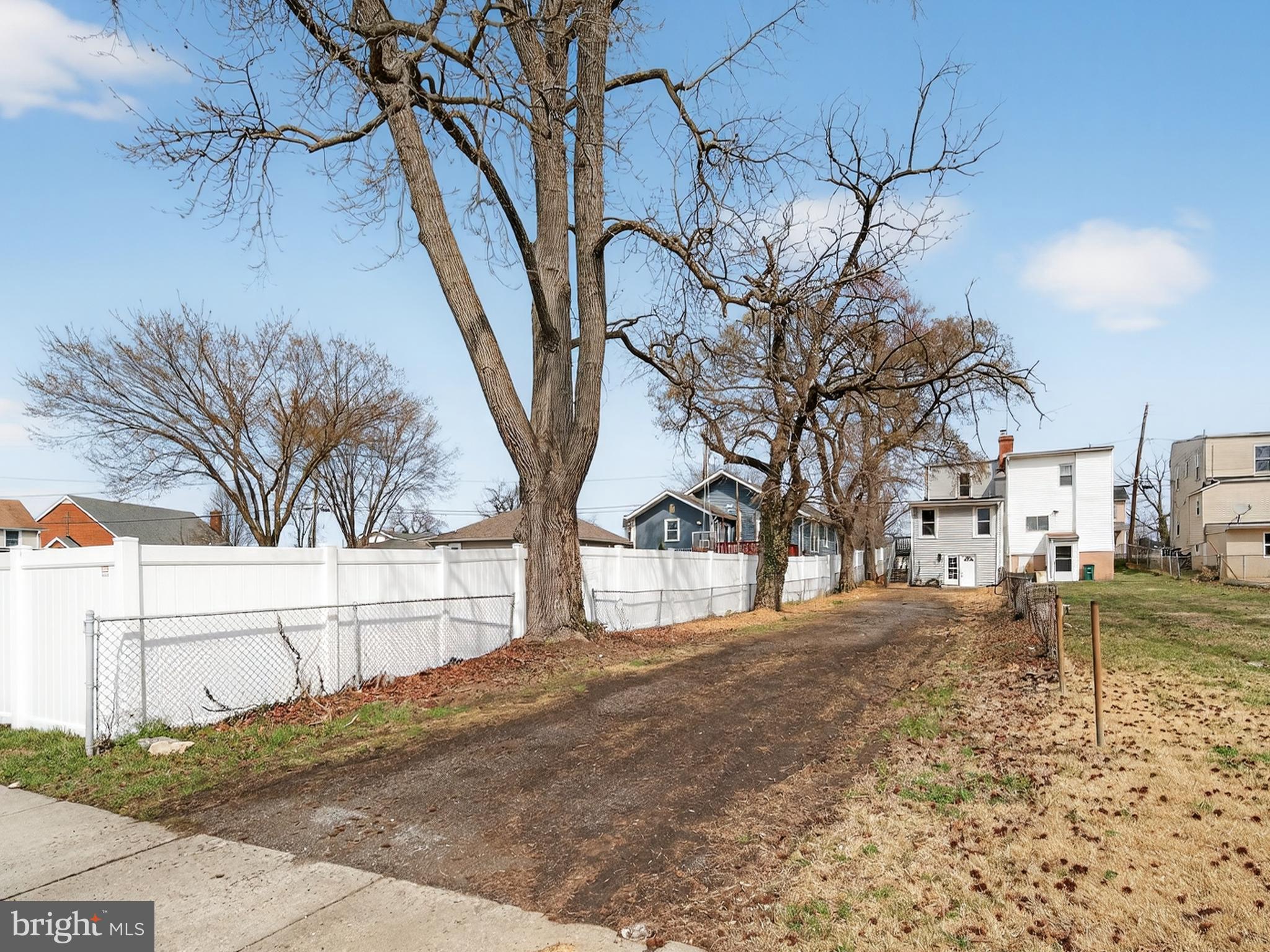 5919 Addison Road Capitol Heights, MD 20743 - Photo 38 of 40 a view of a yard with a snow