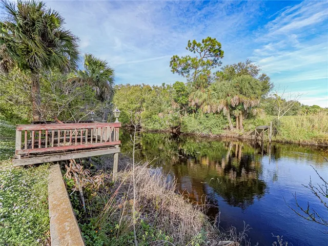 a sign that is sitting on a wooden floor