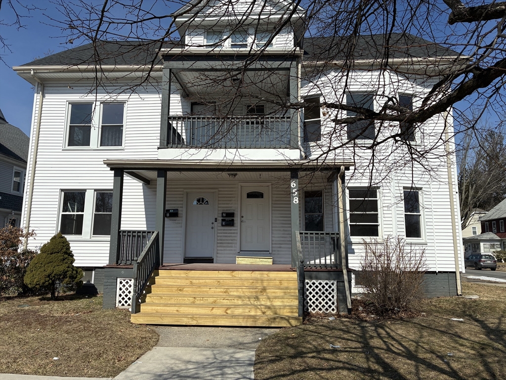 658 Sumner Avenue, Unit 2 Springfield, MA 01108 - Photo 1 of 11 a view of a house with wooden floor