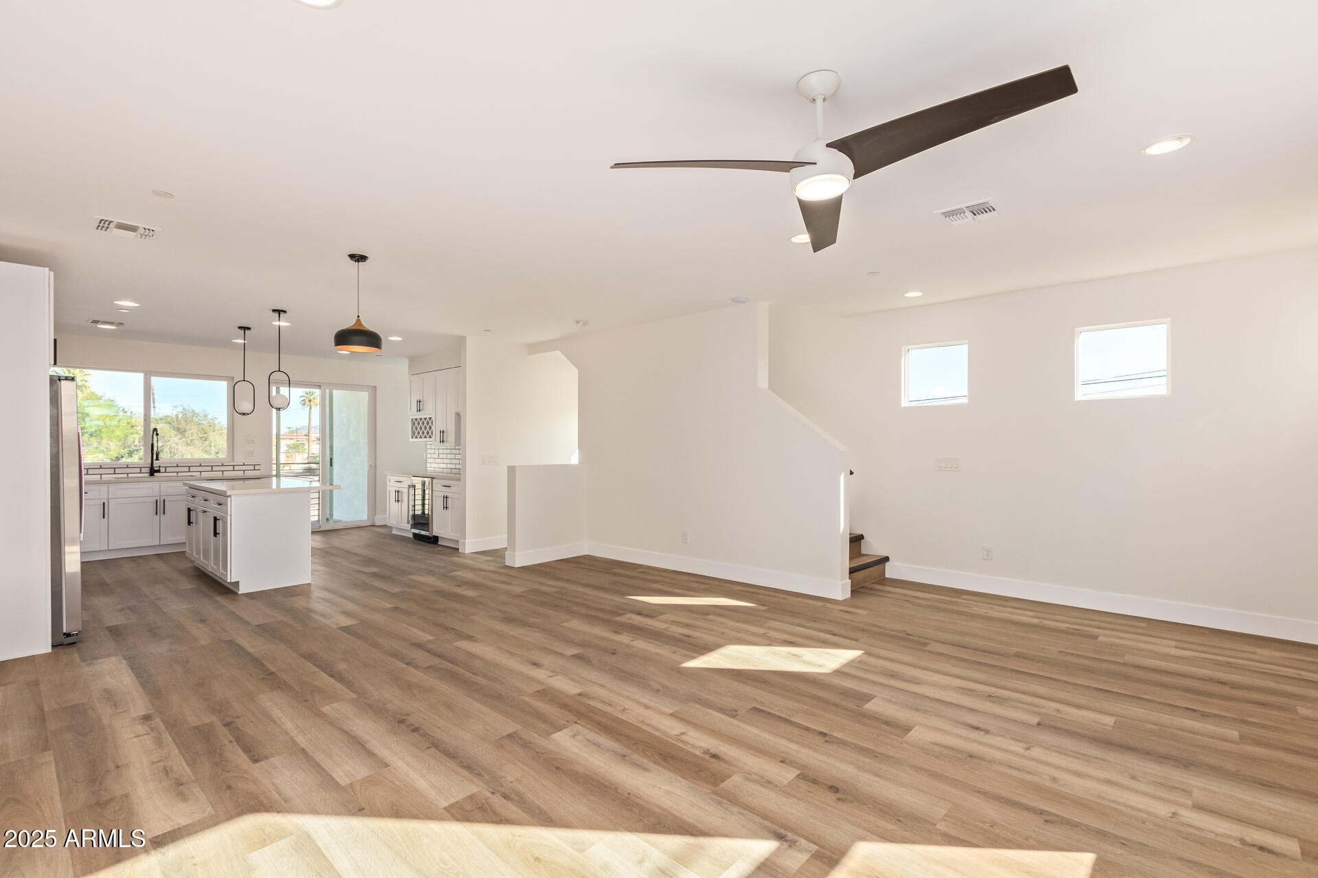 3616 North 12th Street Phoenix, AZ 85014 - Photo 12 of 25 a view of a livingroom with wooden floor