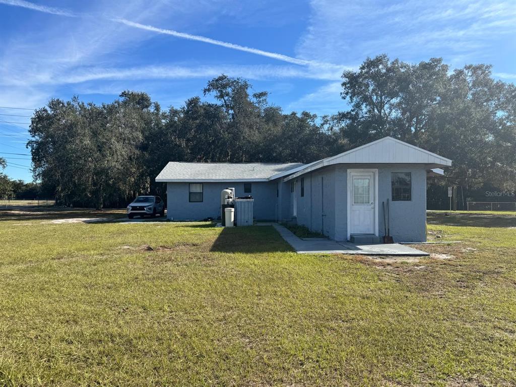 6230 Lake Luther Road Lakeland, FL 33805 - Photo 16 of 21 a house with swimming pool in front of it