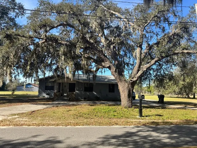 a view of swimming pool with a yard