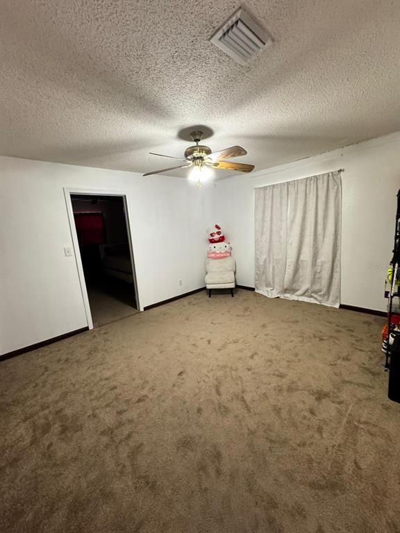 6230 Lake Luther Road Lakeland, FL 33805 - Photo 4 of 21 an empty room with windows