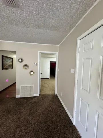 a view of a livingroom with an empty space