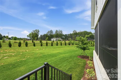 a view of a garden from a balcony