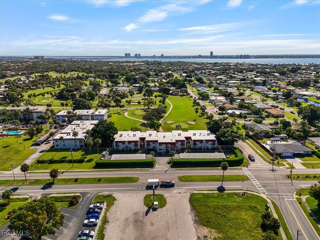 4728 Orange Grove Boulevard, Unit 8 North Fort Myers, FL 33903 - Photo 20 of 31 an aerial view of a city